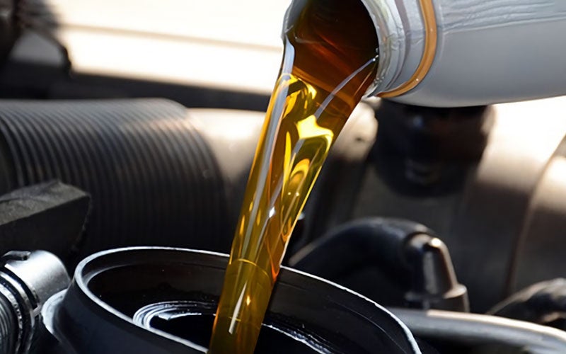 Engine Oil Being Poured